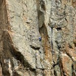 A climber on Guide's Route on Rock Springs Buttress.